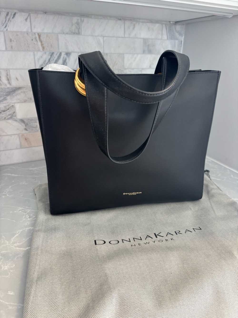 Donna Karan Black Leather Tote with Gold Ring Detail